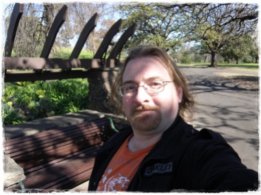 A selfie in front of a bench I used to sleep on when I became homeless in 2009...